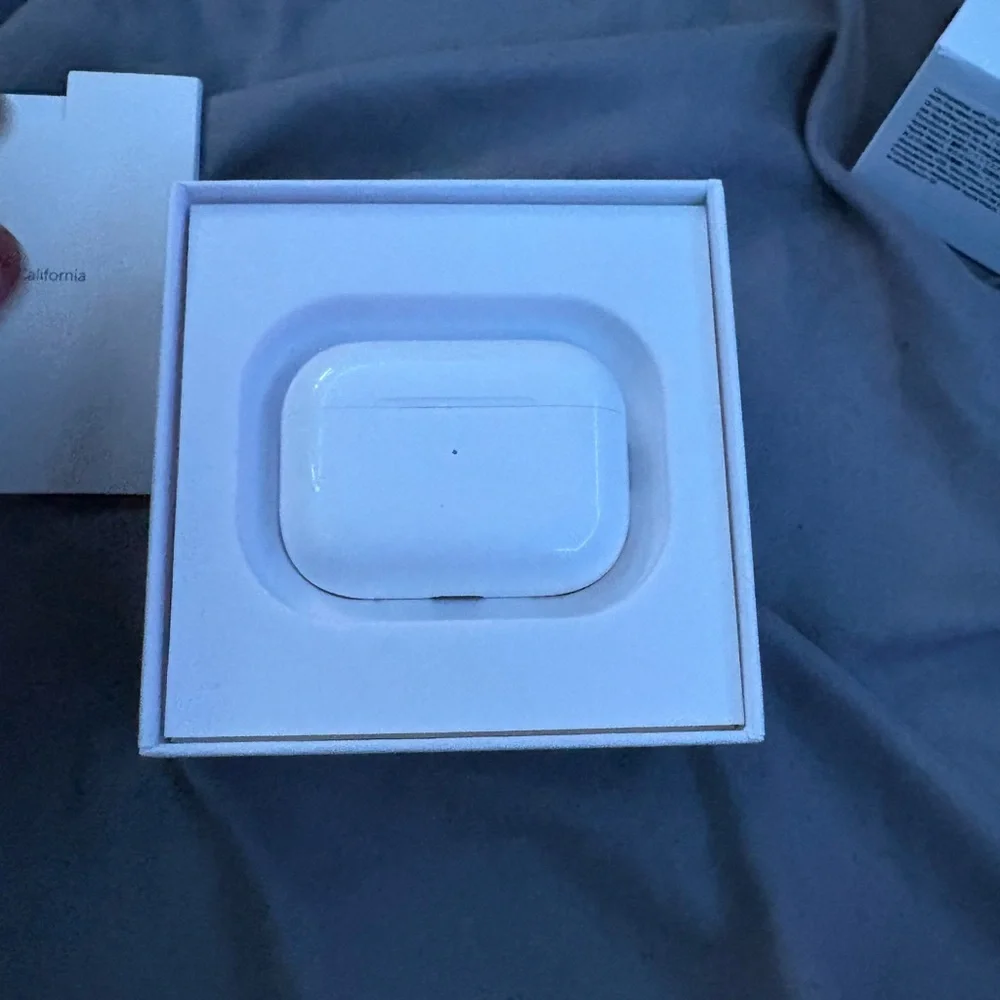 Apple AirPods Pro with White Charging Accessories